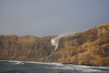 Talisker waterfall retreats back up the cliff in strong winds. Sally Harris.